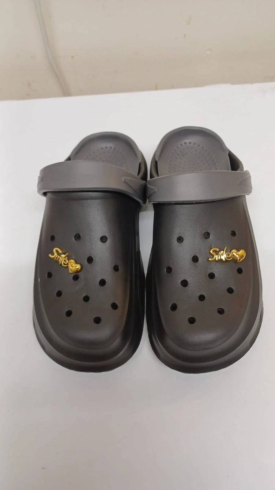 Black EVA Foam Clogs Sandals with Gold “Smile” Charm – Unisex Slip-On Casual Shoes – Sizes EU 40 (UK 6)