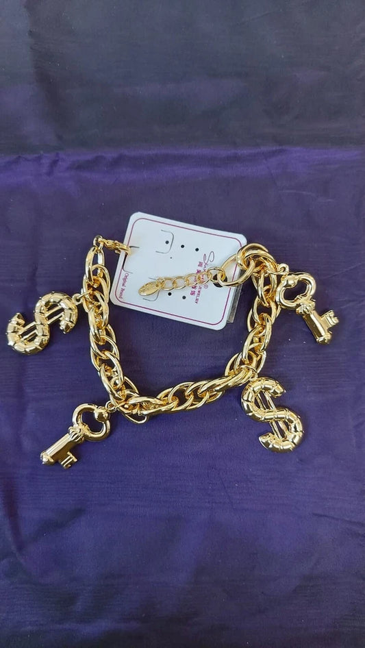 Gold Tone Charming Bracelet with Dollar Sign and Key Pendants